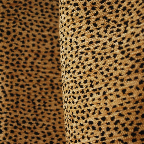 Close up of patterned fabric with spotted feline print