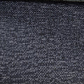 Close-up of textured fabric with a focus on pattern and color.